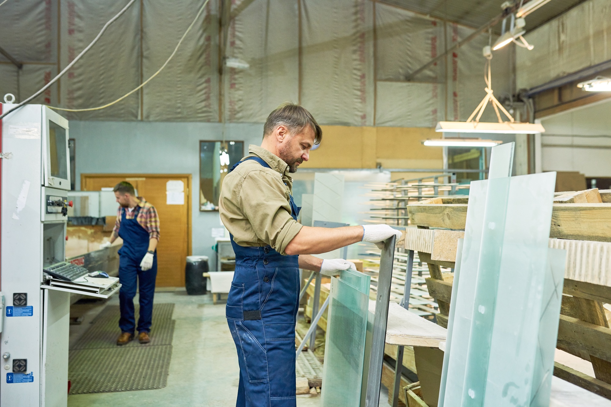 Busy Workers at Modern Furniture Factory